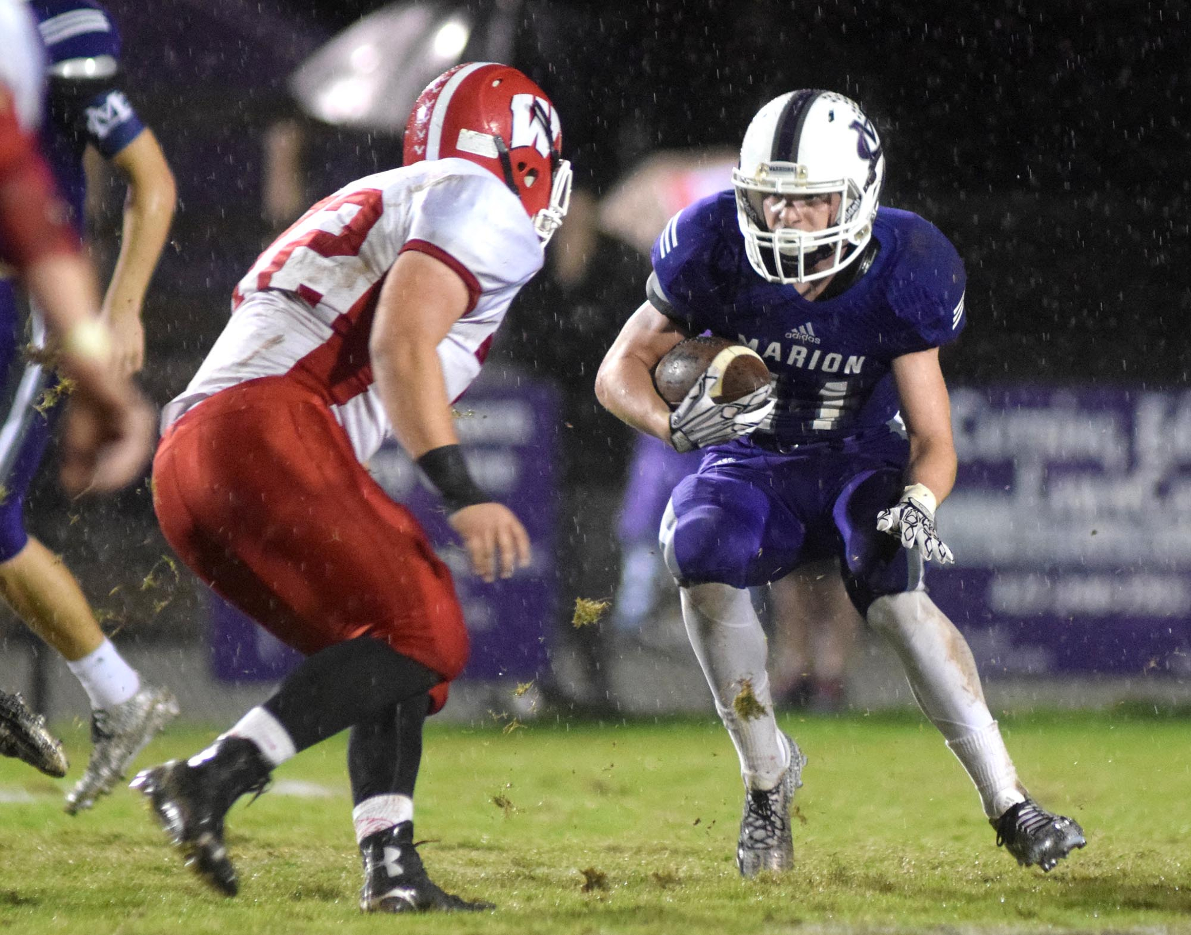 Marion County's Hunter Zeman (11) looks for an opening in the Eagle defense.  The Westmoreland Eagles visited the Marion County Warriors in the first round of the TSSAA football playoffs Friday night, November 6, 2015.