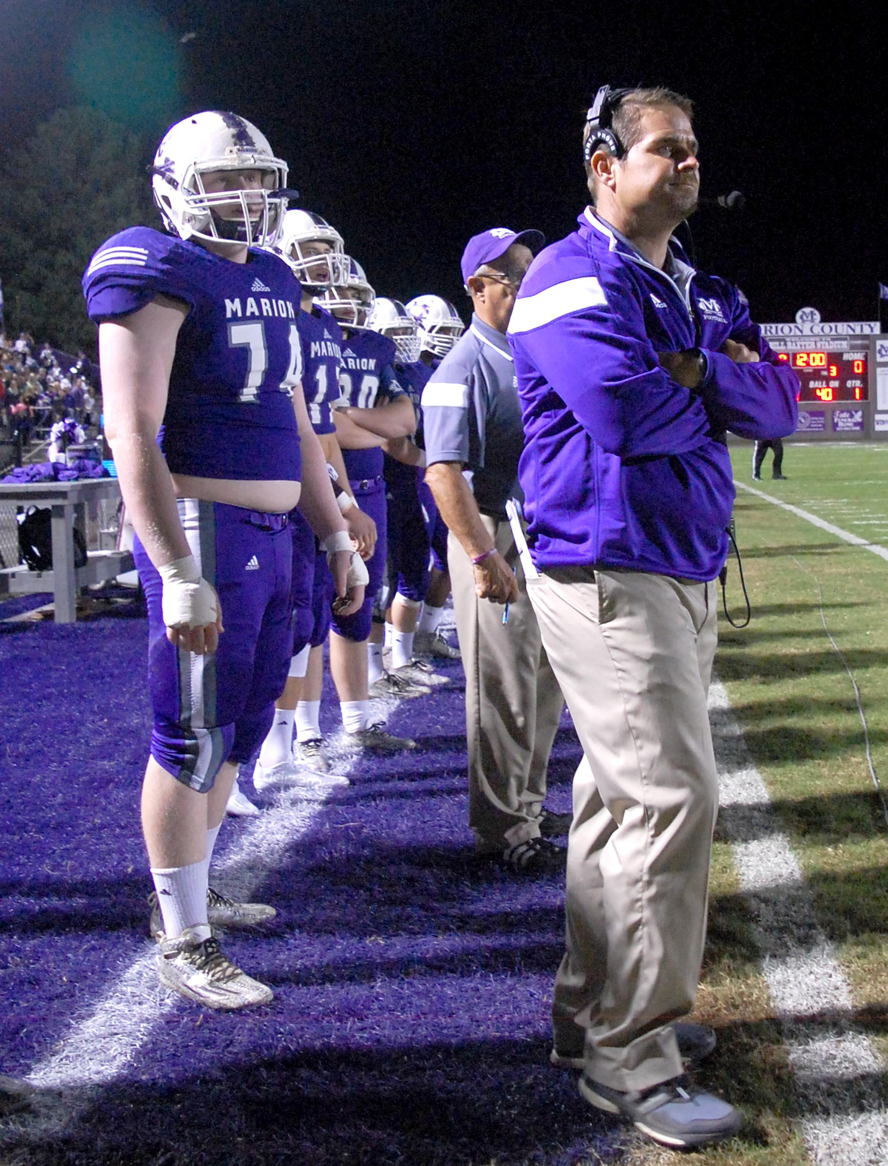 Head coach Ricky Ross and the Warrior bench watch the opening kickoff.  The Westmoreland Eagles visited the Marion County Warriors in the first round of the TSSAA football playoffs Friday night, November 6, 2015.