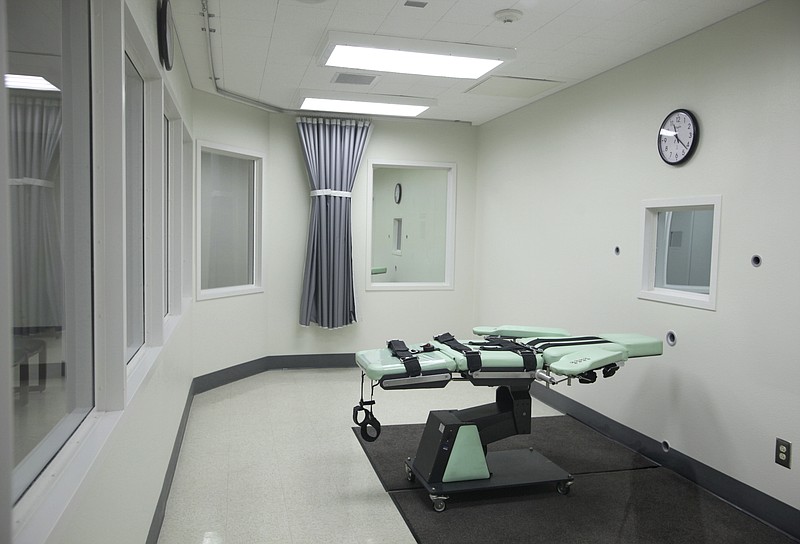 
              FILE - This Sept. 21, 2010, file photo shows the death chamber of the new lethal injection facility at San Quentin State Prison in San Quentin, Calif. California proposed Friday, Nov. 6, 2015, to allow corrections officials to choose one of four types of barbiturates to execute prisoners on death row depending on what’s available, as states deal with a nationwide shortage of execution drugs. (AP Photo/Eric Risberg, File)
            