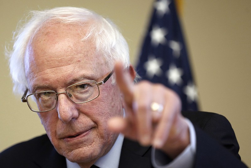 
              FILE - In this Oct. 30, 2015, file photo, Democratic presidential candidate Sen. Bernie Sanders, I-Vt, speaks during a campaign stop at the William B. Cashin Senior Activity Center in Manchester, N.H. Sanders is planning an aggressive push aimed at regaining ground in the Democratic primaries, planning a series of ads, policy speeches and appearances before key constituency groups in his bid against presidential front-runner Hillary Rodham Clinton. (AP Photo/Jim Cole, File)
            