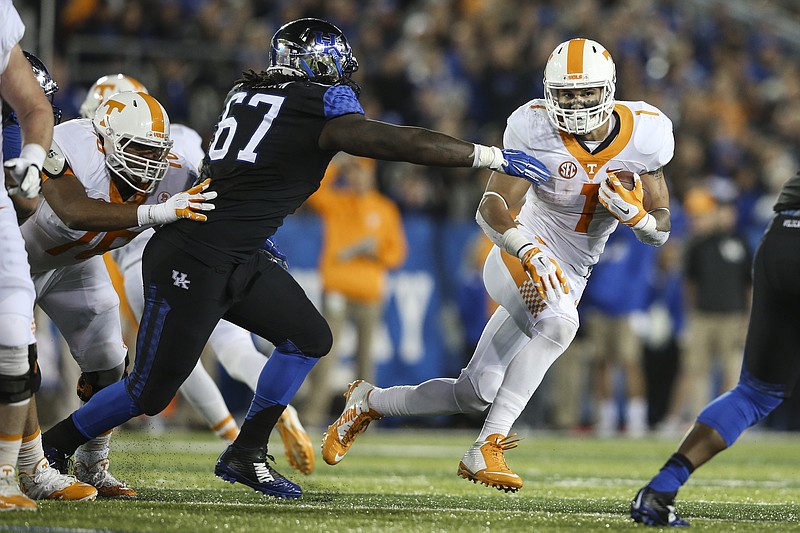 Tennessee running back Jalen Hurd looks for running room against Kentucky's defense. (Photo By Matthew DeMaria/Tennessee Athletics)