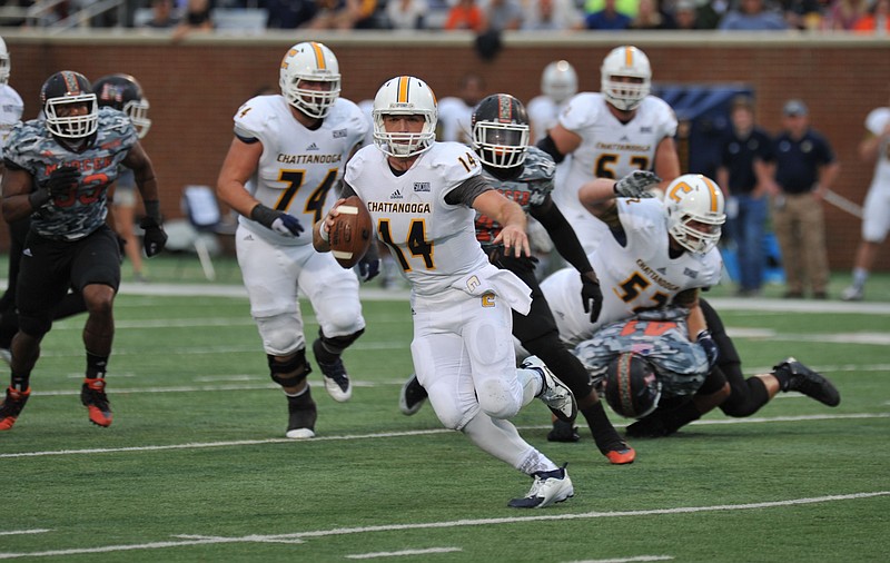 UTC quarterback Jacob Huesman runs the ball against Mercer in the Bears' 17-14 win Saturday in Macon, Ga.