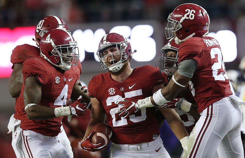 Alabama linebacker Dillon Lee (25) celebrates after intercepting a pass during the second half of Saturday's home game against LSU, a 30-16 victory over the Tigers. The Crimson Tide can earn the SEC West title and their latest trip to Atlanta for the conference championship game with victories against Mississippi State and Auburn.