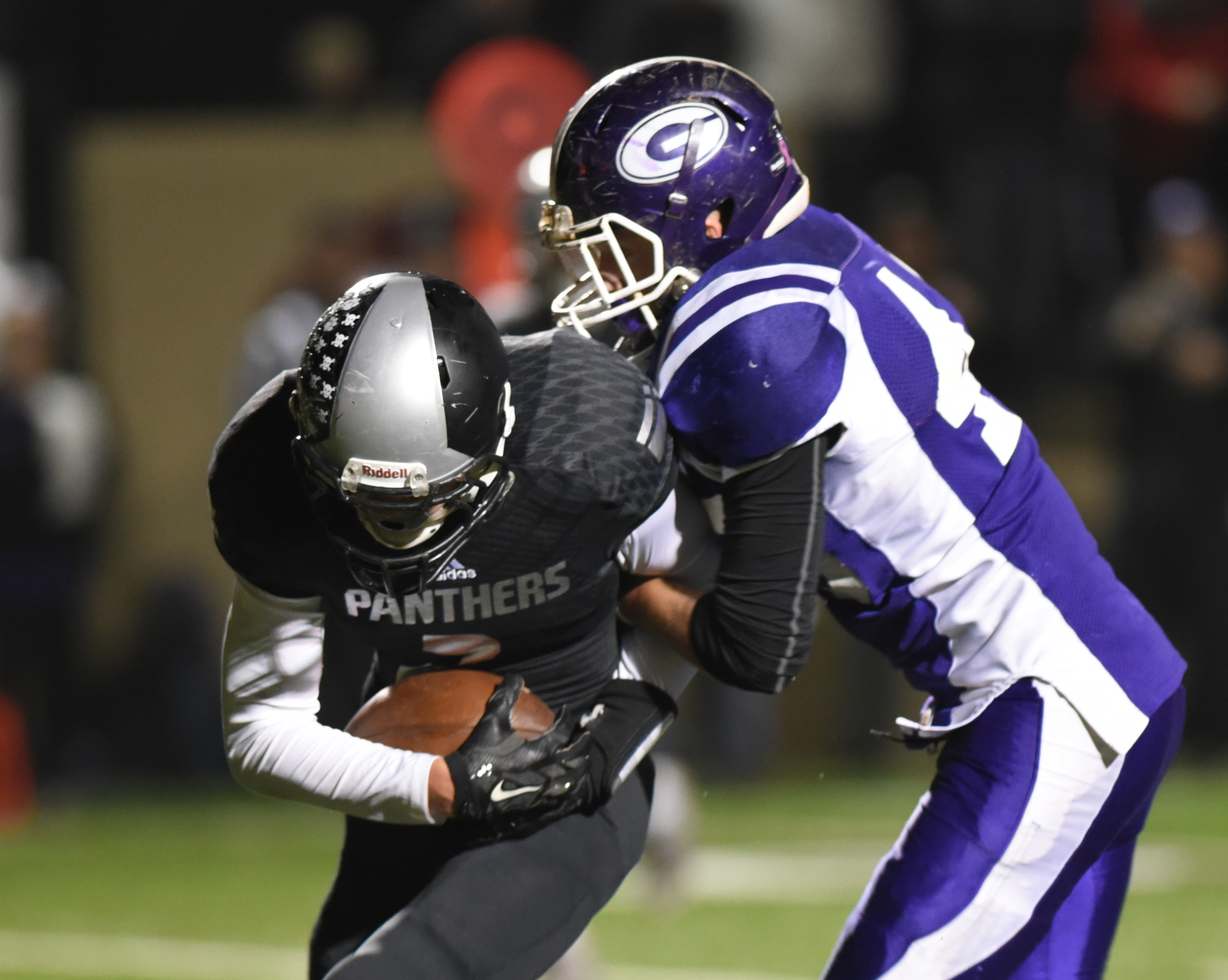 Ridgeland's Jeremy Masley intercepts a ball intended for Gilmer County's Noble Nuschlag Monday, November 9, 2015 at Christian Heritage School.