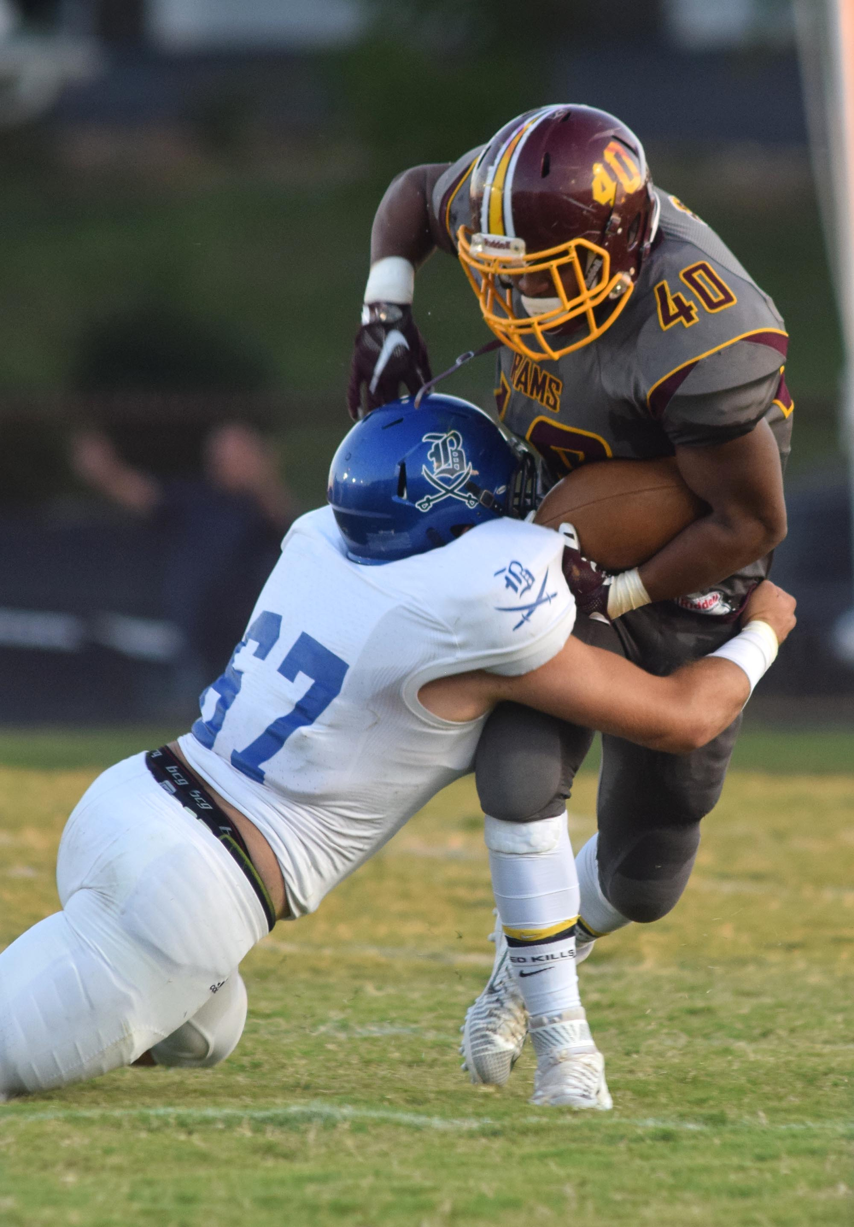 Boyd-Buchanan's Will Watkins (67) tackles Tyner's Brandon Jackson (40) in the first quarter. The Boyd-Buchanan Buccaneers visited the Tyner Rams in TSSAA football action Saturday September 18, 2015.