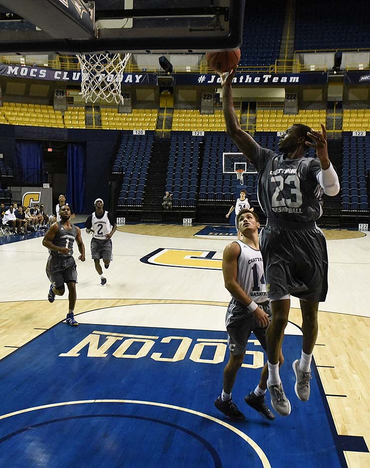 Tre' McLean shoots as the UTC men's basketball team holds a scrimmage at McKenzie Arena on Sunday, Oct. 18, 2015, in Chattanooga, Tenn.