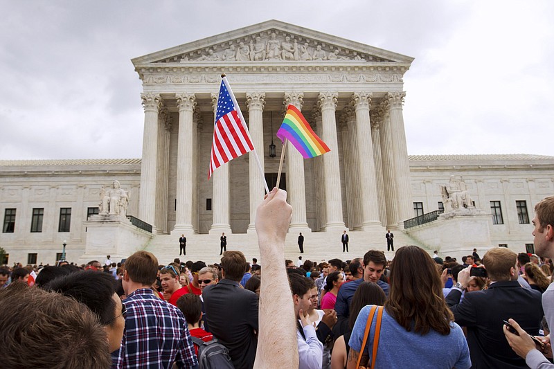 The crowd celebrates outside of the Supreme Court in Washington on June 26 after the court declared that same-sex couples have a right to marry anywhere in the U.S.