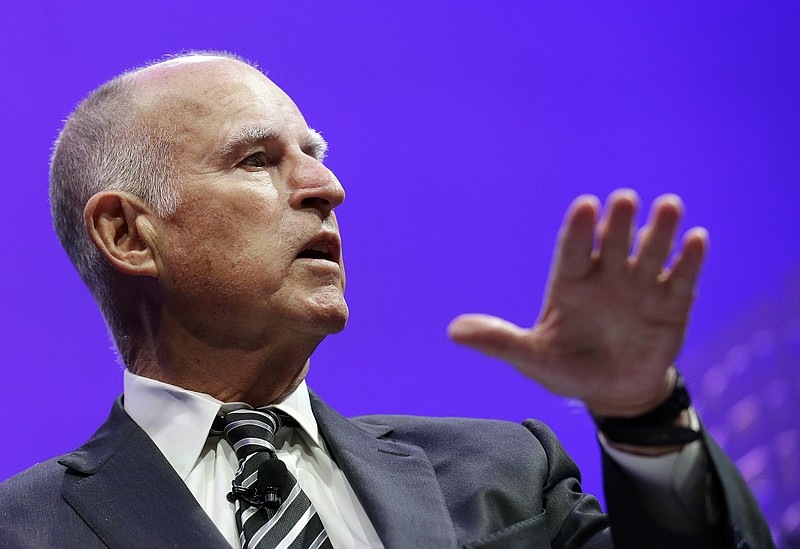 
              FILE - In this Nov. 2, 2015, file photo, Gov. Jerry Brown speaks on a panel at the Fortune Global Forum in San Francisco. A worker in the state oil and gas regulatory agency lodged a whistleblower’s complaint over being ordered to prepare a state map of the oil and gas potential, history and geology of  Brown’s family ranch, the worker and her attorney said Monday, Nov. 9, 2015. (AP Photo/Jeff Chiu,File)
            