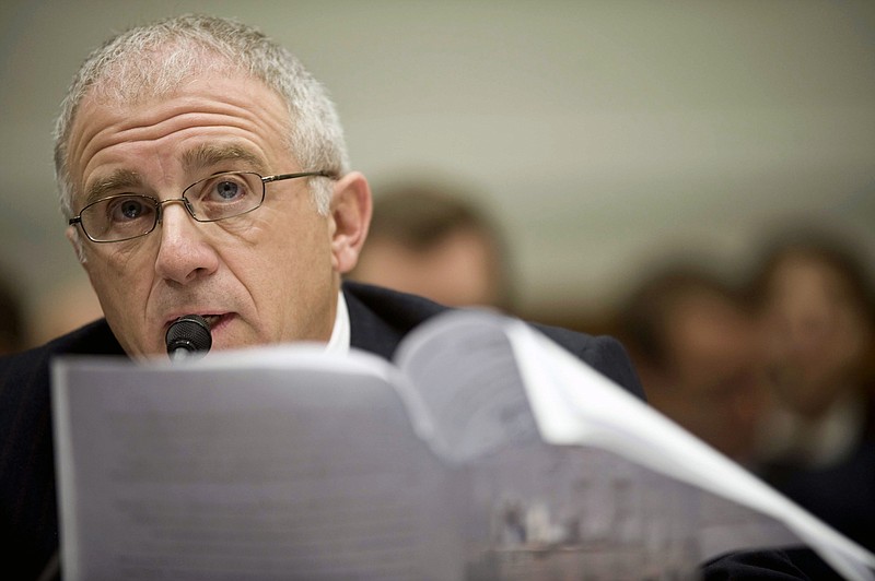 
              FILE - In this Thursday, Feb. 26, 2009, file photo, Ticketmaster Entertainment CEO Irving Azoff reads his opening statement on Capitol Hill in Washington, as he testifies before the House Courts and Competition Policy subcommittee in Washington. The Recording Academy announced Monday, Nov. 9, 2015, that Azoff will receive the President's Merit Award at The Beverly Hilton in Beverly Hills on Feb. 14, 2016, a day before the Grammy Awards. (AP Photo/Kevin Wolf, File)
            