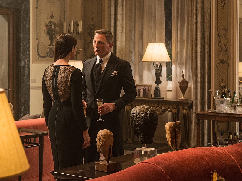 
              In this image released by Metro-Goldwyn-Mayer Pictures/Columbia Pictures/EON Productions, Monica Bellucci, left, and Daniel Craig appear in a scene from the James Bond film, "Spectre." The movie releases in U.S. theaters on Nov. 6, 2015. (Jonathan Olley/Metro-Goldwyn-Mayer Pictures/Columbia Pictures/EON Productions via AP)
            