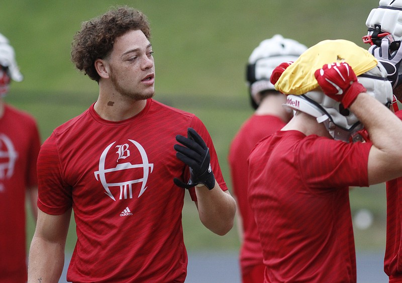 Baylor tight end/linebacker Gage Upshaw, left, gestures during a 2014 practice. Upshaw has committed to play football for the Air Force Academy, becoming the third Red Raider to accept an offer to play at a Division I school.