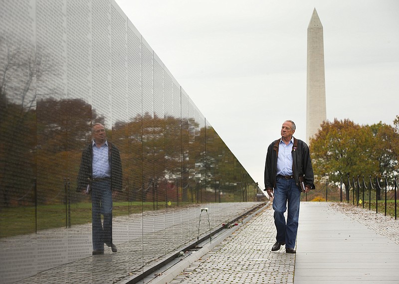 Jan C. Scruggs visits the Vietnam Veterans Memorial in Washington. Scruggs, who led efforts to build the memorial on the National Mall, is calling for a national memorial for Iraq and Afghanistan veterans. The Commemorative Works Act stipulates that a decade must pass before work can begin on a memorial, but supporters say the war on terror may never end.