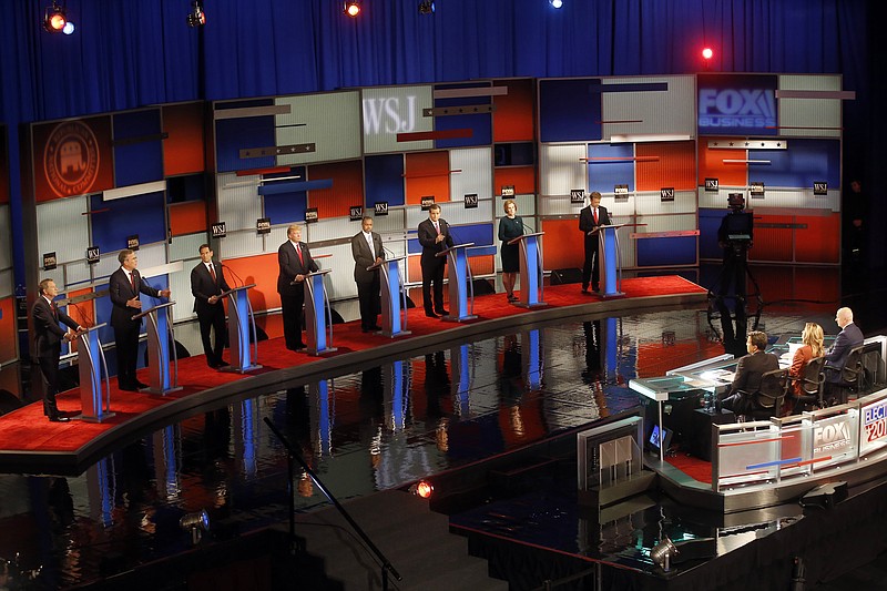 Republican presidential candidates, from left, John Kasich, Jeb Bush, Marco Rubio, Donald Trump, Ben Carson, Ted Cruz, Carly Fiorina and Rand Paul took part in the Fox Business Network debate on Tuesday.