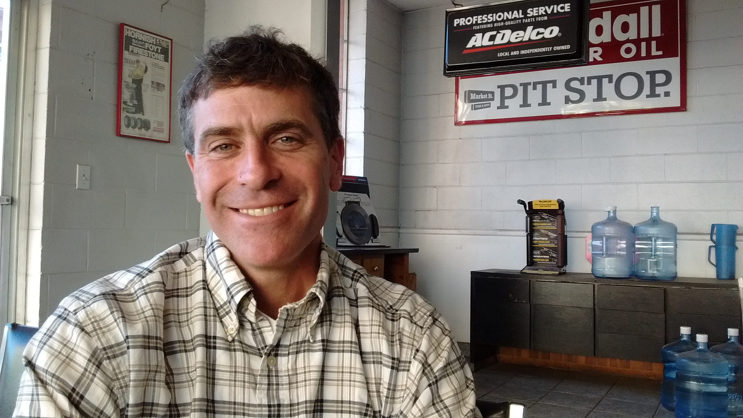 Idealism, not hard-nosed commerce, inspired Krue Brock to buy Market Street Tire & Auto in downtown Chattanooga.
