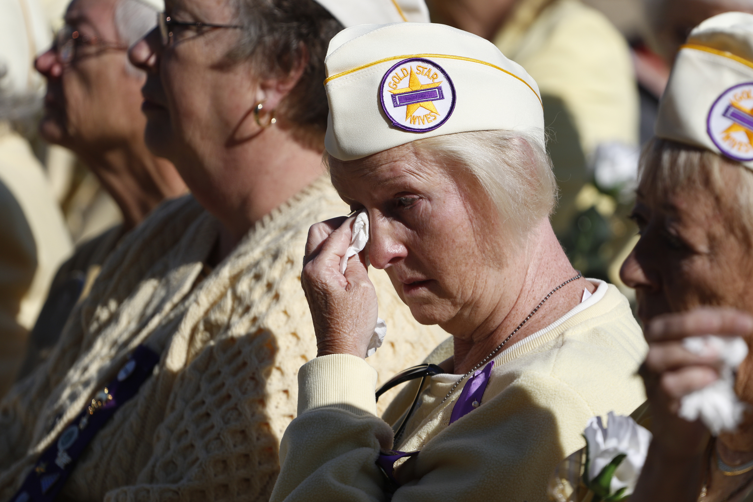 Staff Photo by Dan Henry / The Chattanooga Times Free Press- 11/11/15. Gold Star Wife Carol Jackson becomes emotional during a special Veteranճ Day tribute on November, 11, 2015 at the Chattanooga National Cemetery Armed Forces Pavillon. The Chattanooga National Cemetery and the Chattanooga Area Veterans Council hosted the event.