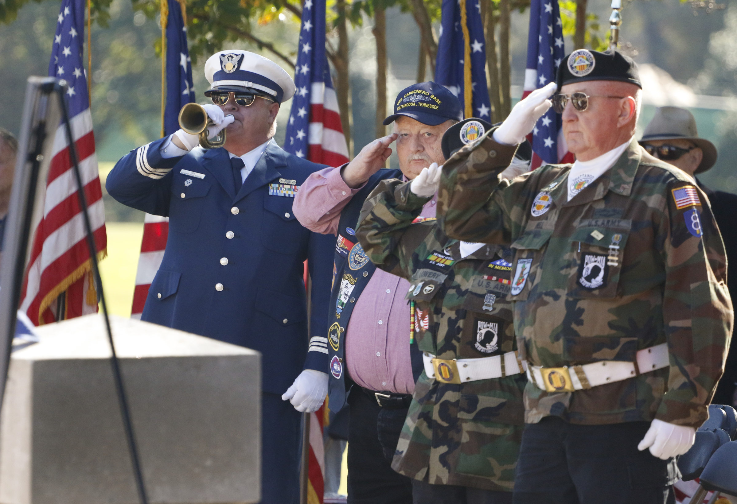 Staff Photo by Dan Henry / The Chattanooga Times Free Press- 11/11/15. David Cox plays Taps on his bugle for patriots, veterans and officials during a special Veteranճ Day tribute on November, 11, 2015 at the Chattanooga National Cemetery Armed Forces Pavillon. The Chattanooga National Cemetery and the Chattanooga Area Veterans Council hosted the event.