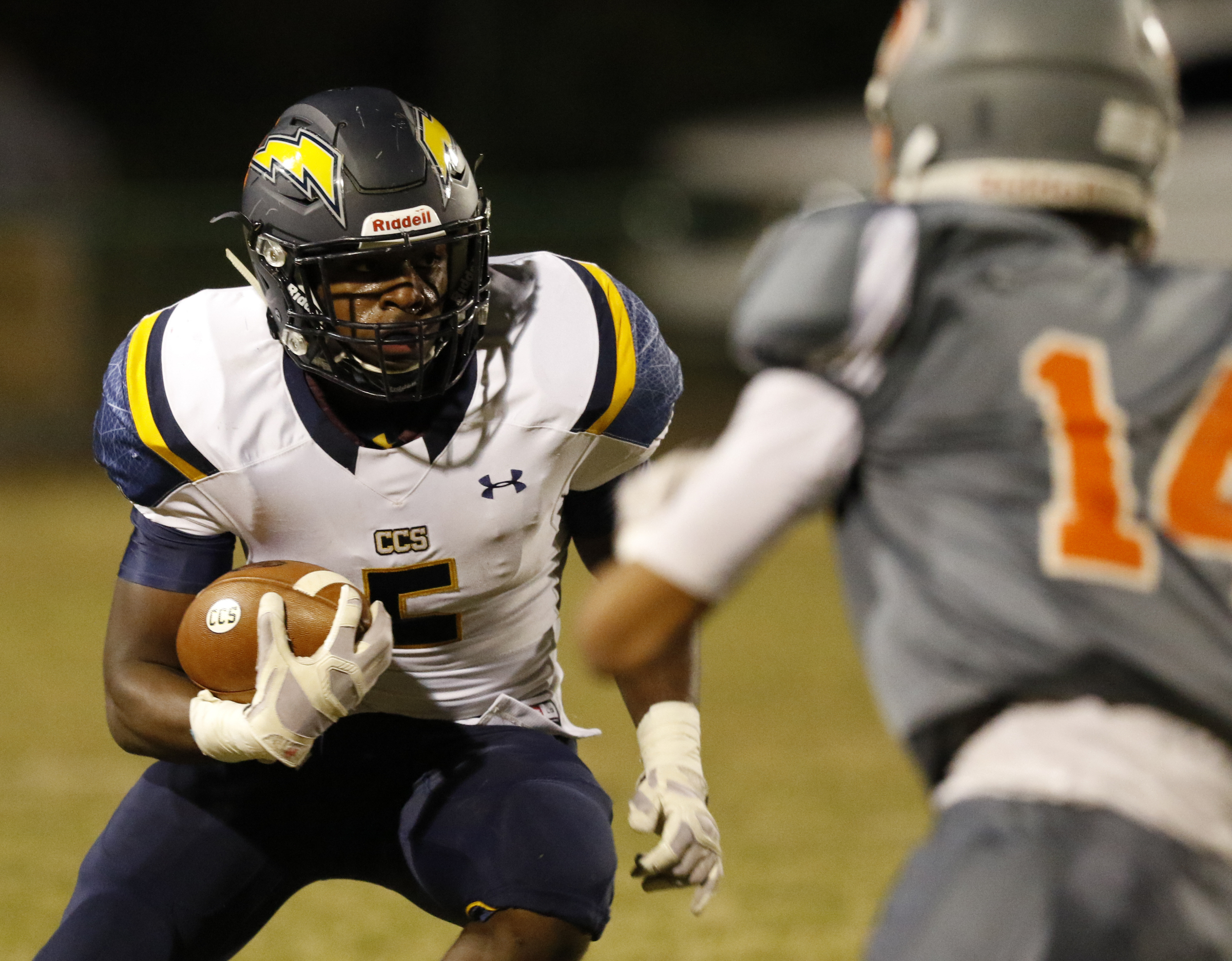 *Staff Photo by Dan Henry / The Chattanooga Times Free Press- 11/13/15. Chattanooga Christian's DJ Toney (5) runs the ball while playing East Ridge at the Pioneer's home field on Friday, November 13, 2015.