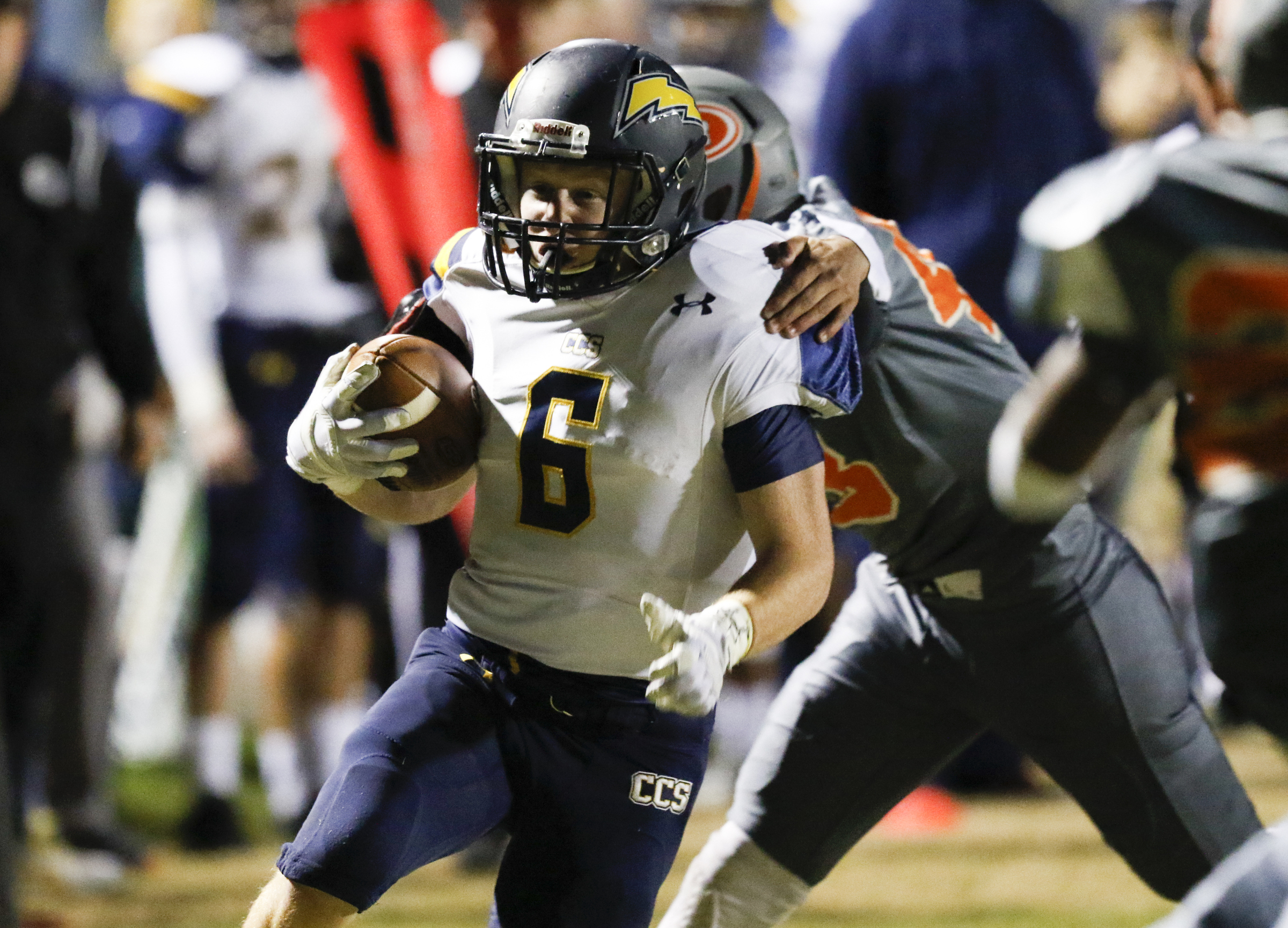 *Staff Photo by Dan Henry / The Chattanooga Times Free Press- 11/13/15. Chattanooga Christian's Justin Wheeler (6) runs the ball while playing against East Ridge at the Pioneer's home field on Friday, November 13, 2015.
