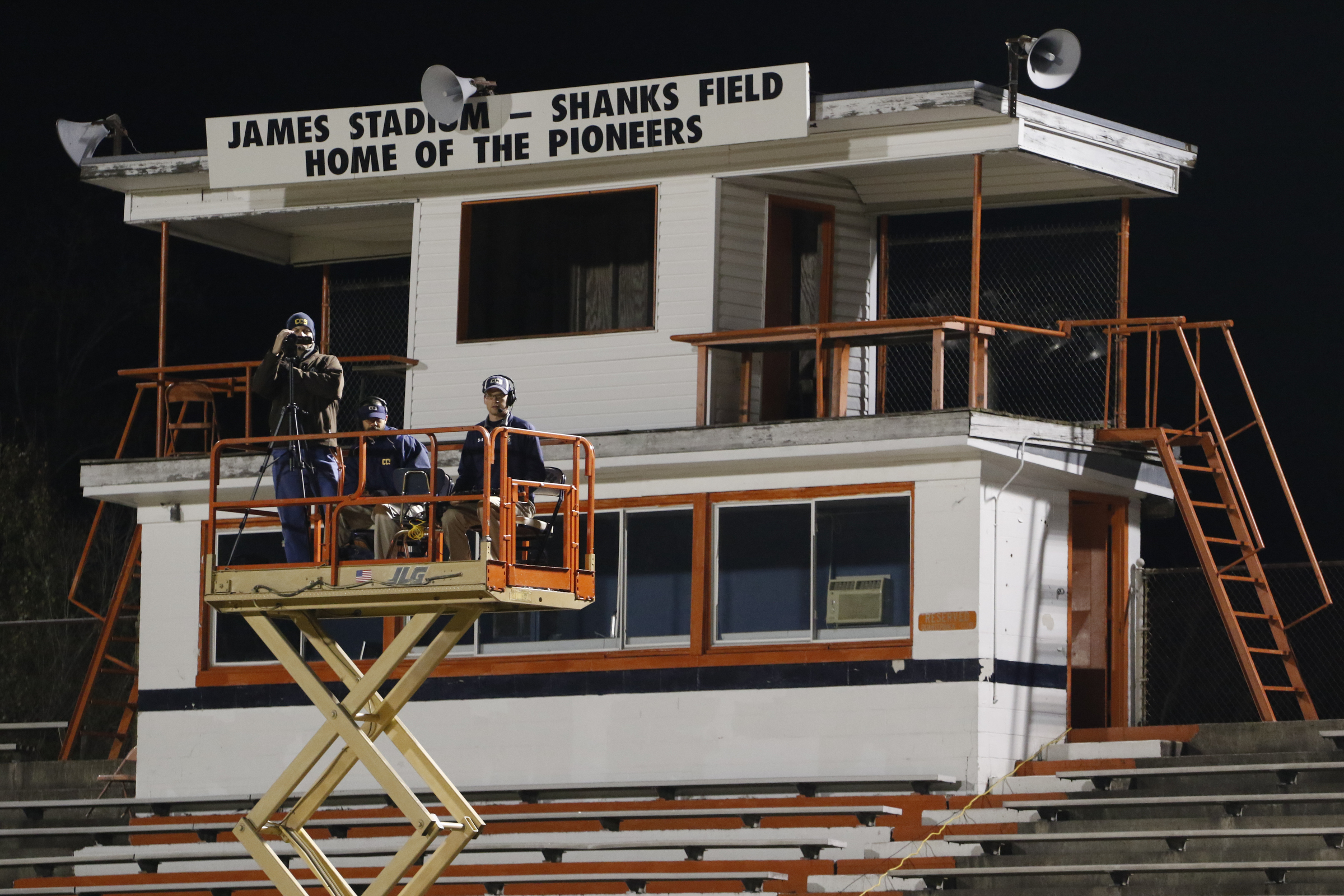 *Staff Photo by Dan Henry / The Chattanooga Times Free Press- 11/13/15. The game announcer uses a lift truck to call the game as East Ridge plays Chattanooga Christian on Friday, November 13, 2015 after the Pioneer's home stadium was condemned.
