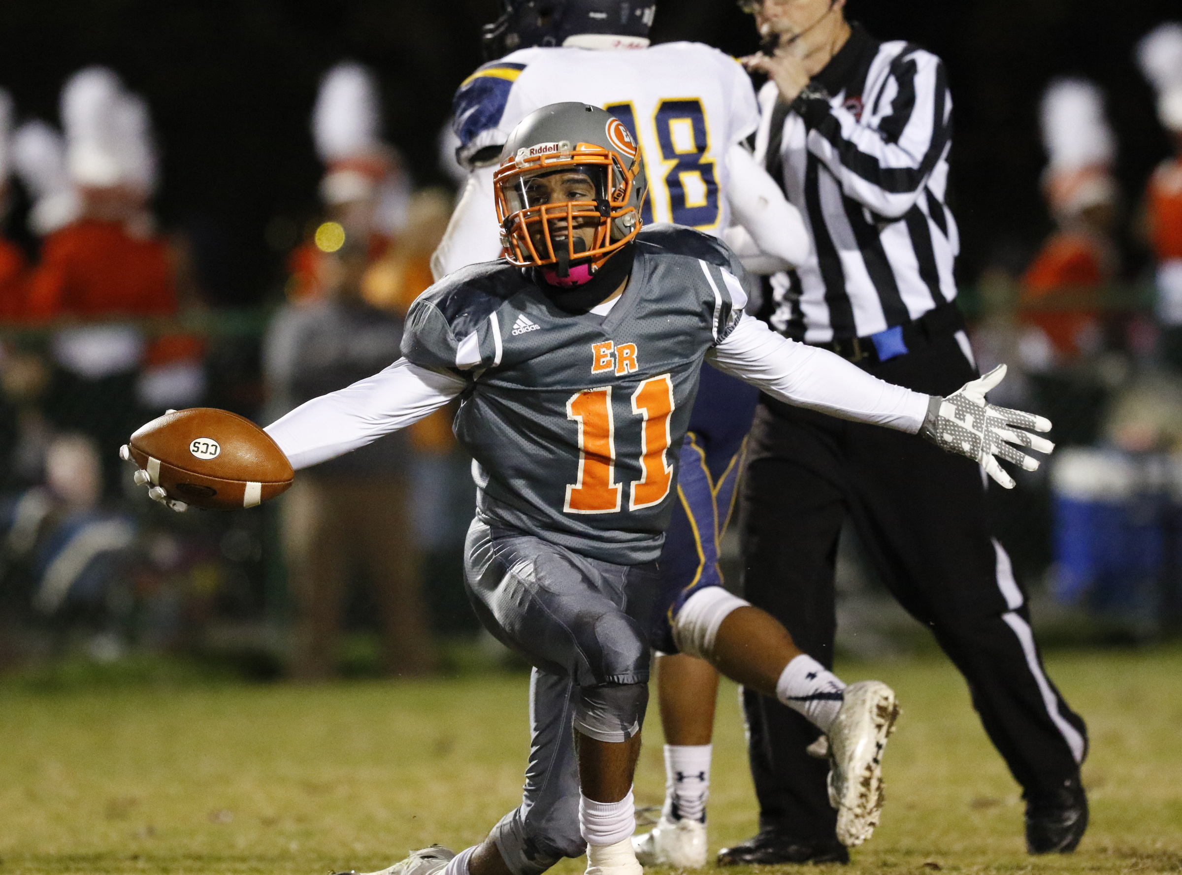 *Staff Photo by Dan Henry / The Chattanooga Times Free Press- 11/13/15. East Ridge's Jesse Jones (11) questions the way he was brought down by Chattanooga Christian defenders at the Pioneer's home field on Friday, November 13, 2015.