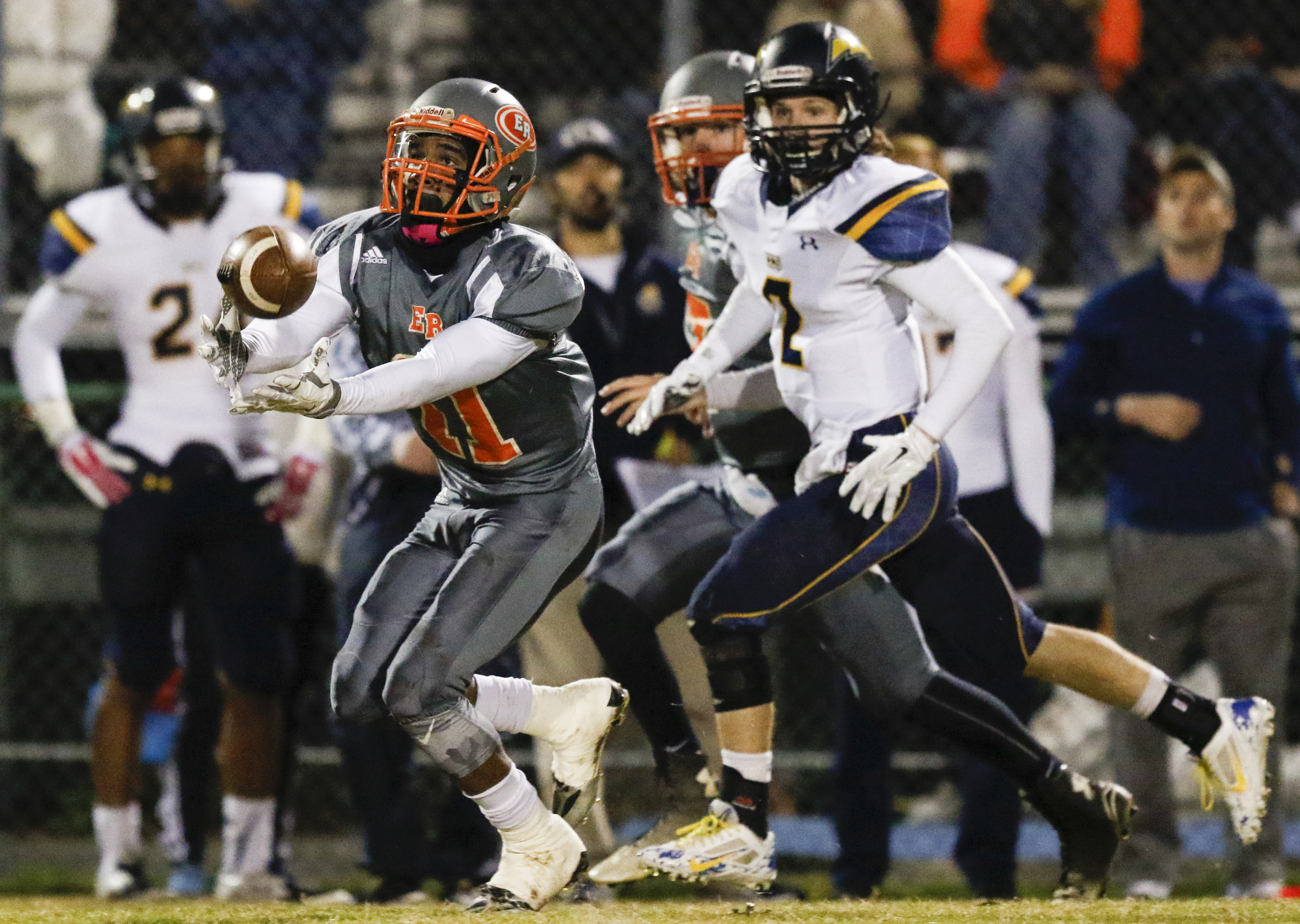 *Staff Photo by Dan Henry / The Chattanooga Times Free Press- 11/13/15. East Ridge's Jesse Jones (11) reaches for a long pass while playing Chattanooga Christian at the Pioneer's home field on Friday, November 13, 2015.