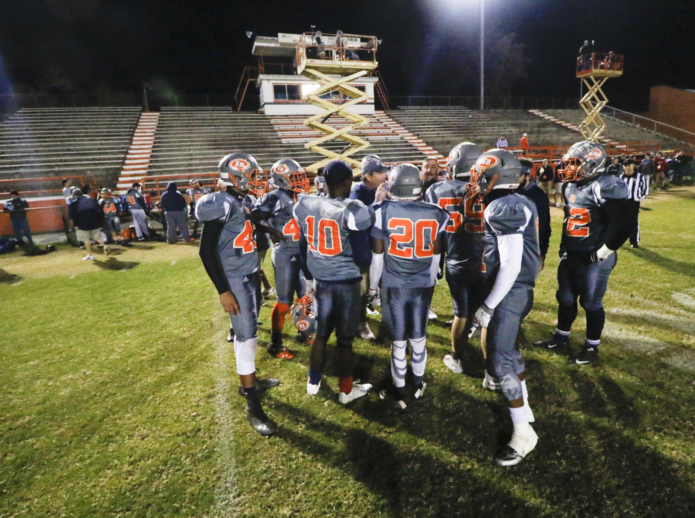 *Staff Photo by Dan Henry / The Chattanooga Times Free Press- 11/13/15. East Ridge huddles in front of their condemned stadium while playing Chattanooga Christian at the Pioneer's home field on Friday, November 13, 2015.