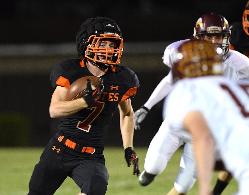 South Pittsburg's Chase Blevins (7) carries the ball in the first quarter.  Grace Baptist Academy visited South Pittsburg in aTSSAA football game on Friday, October 16, 2015.