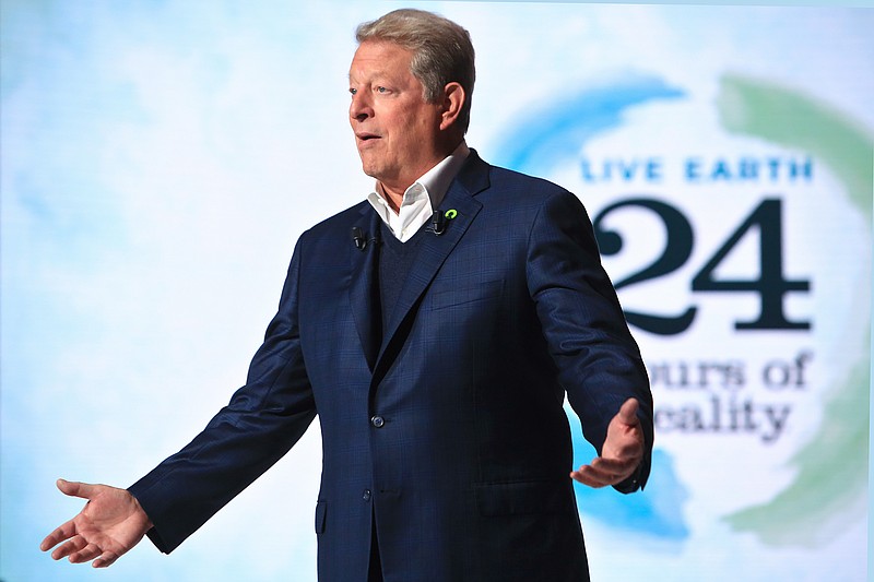 
              Former U.S. Vice President Al Gore hosts a 24-hour live webcast from the foot of the Eiffel Tower, in Paris, Friday, Nov. 13, 2015. Gore, who helped negotiate the 1997 climate treaty that failed to control global warming, will host the round-the-clock event that includes musical performances by Elton John, Duran Duran and others. Other concerts will be broadcast from locations around the globe, from Rio de Janeiro to Miami, Sydney and Cape Town. (AP Photo/Thibault Camus)
            