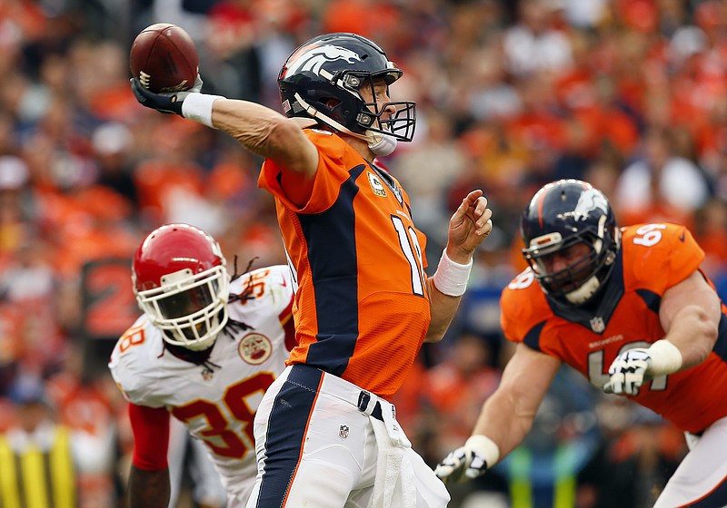 
              Denver Broncos quarterback Peyton Manning (18) throws during the first half of an NFL football game against the Kansas City Chiefs, Sunday, Nov. 15, 2015, in Denver. (AP Photo/Joe Mahoney)
            