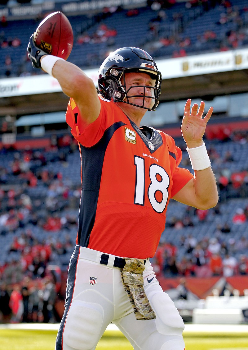 
              Denver Broncos quarterback Peyton Manning (18) warms up prior to an NFL preseason football game against the Kansas City Chiefs, Sunday, Nov. 15, 2015, in Denver. (AP Photo/Jack Dempsey)
            