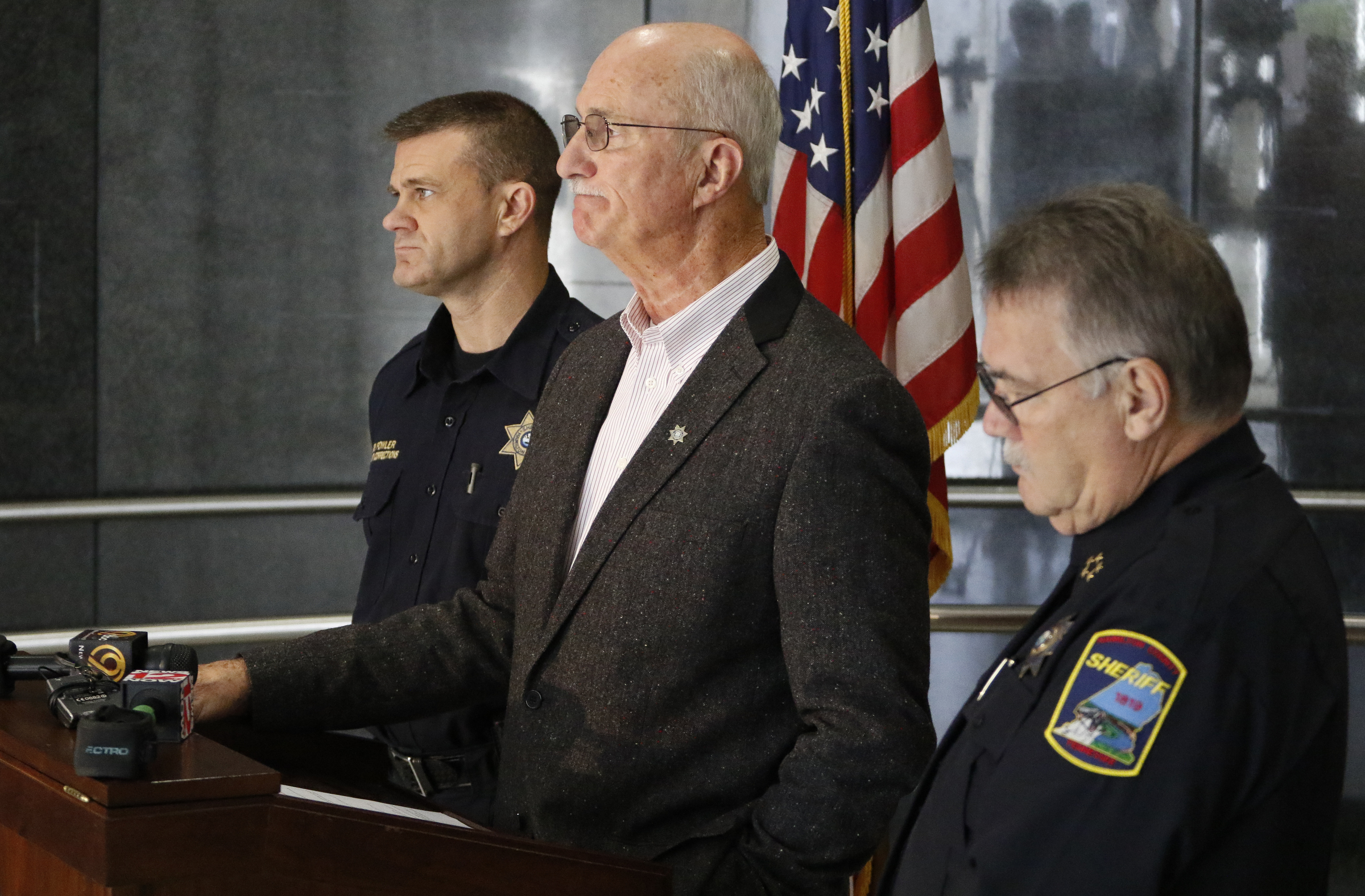 From left, Joe Fowler, Chief of Corrections, Hamilton County Sheriff Jim Hammond and Chief Allen Branum speak about a new video kiosk that will be used for all visitation for inmates at the jail in downtown Chattanooga.