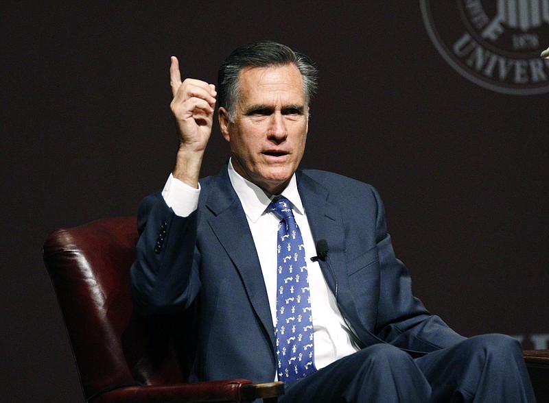 
              FILE - In this Jan.28, 2015 file photo former Republican presidential candidate Mitt Romney speaks in Starkville, Miss. Republicans are using the latest attacks in Paris to appeal to U.S. voters jittery about terrorism. Several Republicans, including presidential hopeful Jeb Bush and former candidate Mitt Romney, appeared on the television networks Monday to decry President Barack Obama's policies as half-hearted and to suggest that a U.S. ground war against the Islamic State may be inevitable. (AP Photo/Rogelio V. Solis, File)
            