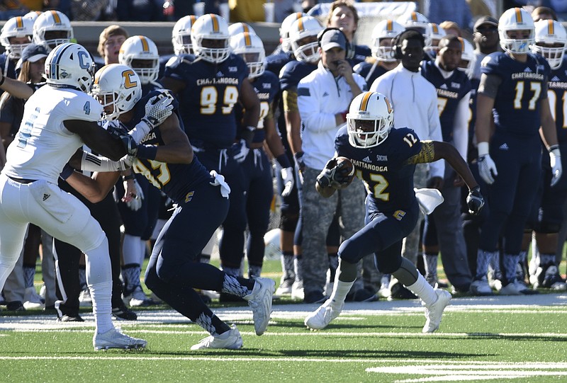UTC receiver Xavier Borishade runs for extra yards after making a catch on Saturday, Nov. 14, 2015, in Chattanooga, Tenn., on the way to a 31-17 win over the Citadel.