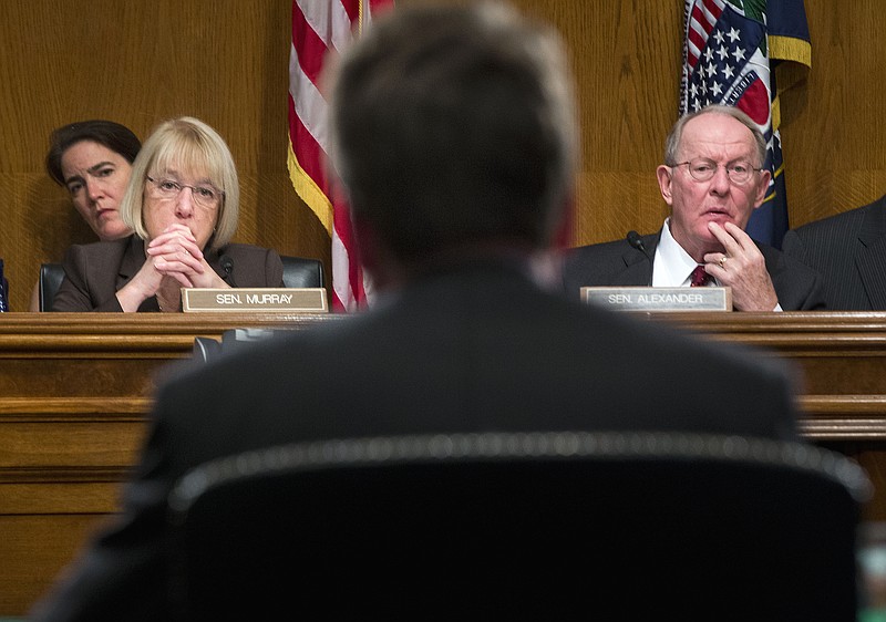 
              Health, Education, Labor and Pensions Committee Chairman Sen. Lamar Alexander, R-Tenn., right, and the committee's ranking member Sen. Patty Murray, D-Wash., left, listen as Dr. Robert Califf., President Barack Obama's choice top lead the Food and Drug Administration (FDA), testifies on Capitol Hill in Washington, Tuesday, Nov. 17, 2015, before the committee's hearing on his nomination.  (AP Photo/Pablo Martinez Monsivais)
            