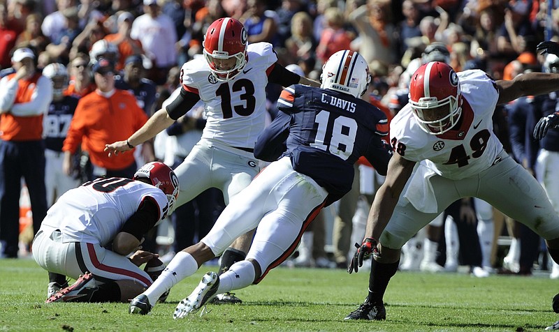 Georgia senior kicker Marshall Morgan (13) made two field-goal attempts and two extra-point tries last week at Auburn and needs 22 more points to become the all-time leading scorer in the Southeastern Conference.