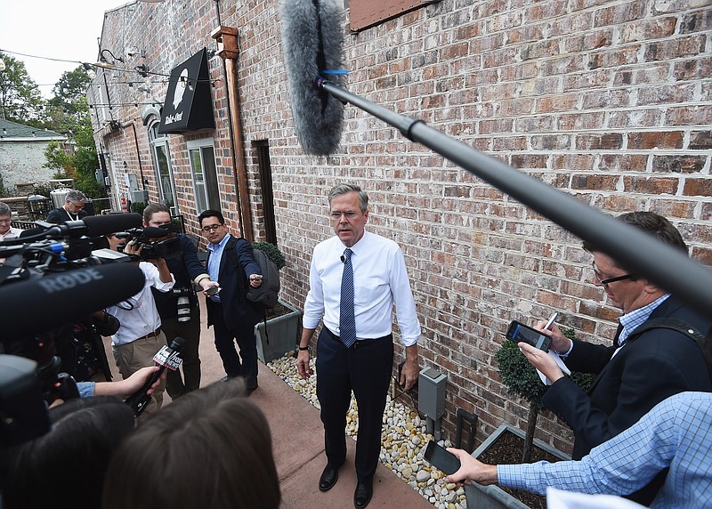 
              Republican presidential candidate, former Florida Gov. Jeb Bush speaks to the media during a campaign stop, Tuesday, Nov. 17, 2015, in Florence, S.C. Bush called the struggle against the Islamic State group "the war of our time." (AP Photo/Rainier Ehrhardt)
            