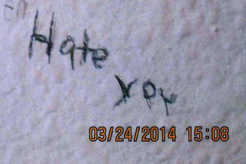 
              This image from evidence gathered by the Naval Criminal Investigative Service during its investigation of Navy Petty Officer 1st Class Darren Yazzie, and obtained by The Associated Press, shows a message written by his victim written on a bedroom wall. Yazzie was convicted in January 2015 of rape of a child and sentenced to 17 years confinement. (Naval Criminal Investigative Service via AP)
            