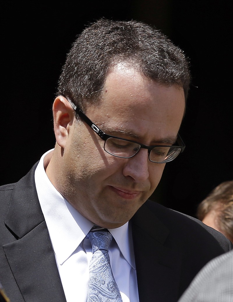 
              FILE - In this Aug. 19, 2015, file photo, former Subway pitchman Jared Fogle leaves the federal courthouse in Indianapolis, following a hearing on child-pornography charges. Fogle is scheduled Thursday, Nov. 19, 2015, to face a federal judge in Indianapolis for sentencing, after agreeing in August to plead guilty to charges of illicit sexual conduct with a minor and receiving child pornography. (AP Photo/Michael Conroy, File)
            