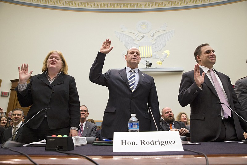 
              From left, Assistant Secretary with the State Department Bureau of Population, Refugees, and Migration Anne Richard, U.S. Citizenship and Immigration Services Director Leon Rodriguez, and Seth Jones, International Security and Defense Policy Center at the RAND Corporation, are sworn in on Capitol Hill in Washington, Thursday, Nov. 19, 2015, prior to testifying before the House Judiciary Immigration and Border Security subcommittee hearing to examine the Syrian refugee crisis and its impact on the security of the U.S. Refugee Admissions Program. (AP Photo/Jacquelyn Martin)
            