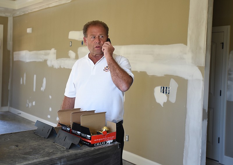 Emerson Russell talks inside of a home in a Ringgold, Ga., subdivision Monday, October 19, 2015.