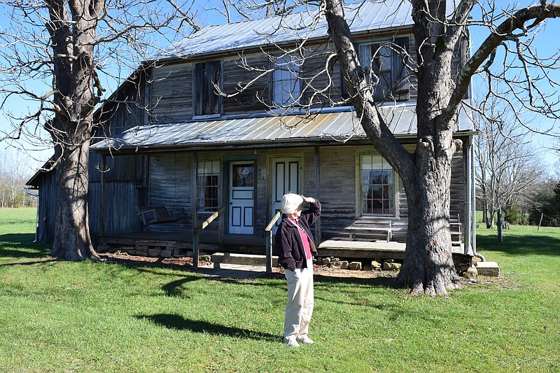 Staff photo by Ben Benton Grundy County Swiss Historical Society president Jackie Lawley on Thursday, Nov. 19, 2015, stands in the front yard of the Stoker-Stampfli Farm Museum in Gruetli-Laager. More than $6,600 worth of antiques and one-of-a-kind artifacts were taken in a burglary on Nov. 12 or 13.