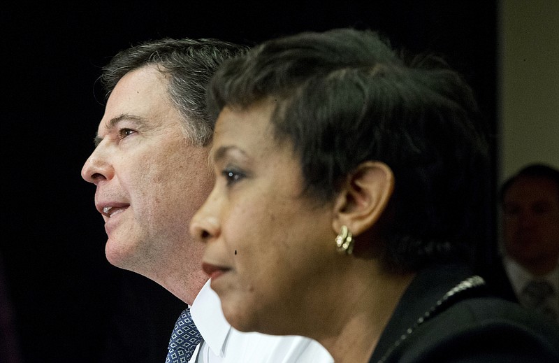
              FBI Director James Comey, left, and Attorney General Loretta Lynch meet with members of the media at Justice Department in Washington, Thursday, Nov. 19, 2015, to discuss the US government's ongoing counterterrorism efforts. (AP Photo/Pablo Martinez Monsivais)
            