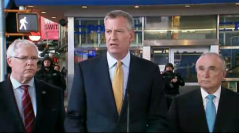 
              In this photo provided by WNYW Fox 5 NY, New York Mayor Bill de Blasio speaks during a news conference in New York's Times Square, Wednesday, Nov. 18, 2015. The New York Police Department says it's aware of a newly released Islamic State group video showing images of Times Square but says there's no current or specific threat to the city. (WNYW Fox 5 NY via AP) MANDATORY CREDIT; NEW YORK OUT; NEW JERSEY OUT; TELEVISION OUT
            