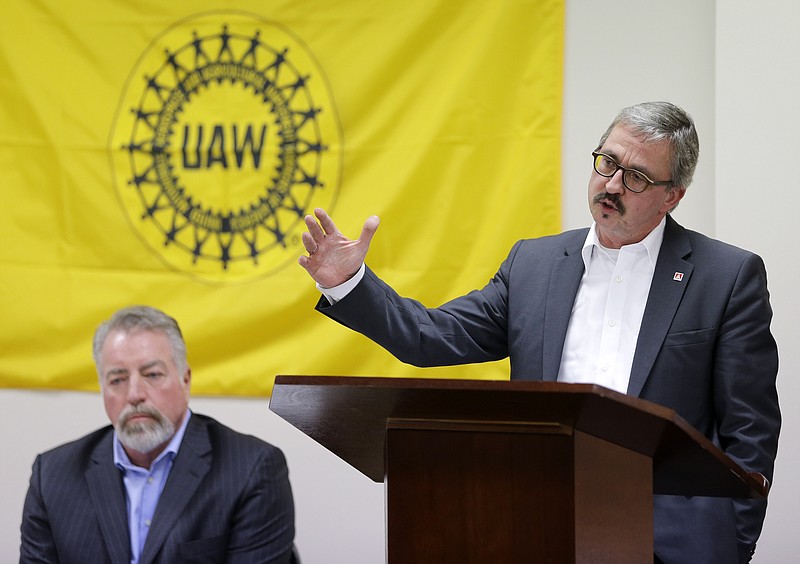 Wolfgang Lemb, right, of the German trade union IG Metall, speaks as Gary Casteel, left, secretary-treasurer of the United Auto Workers, listens during a news conference Thursday, Nov. 19, 2015, in Spring Hill, Tenn. The United Auto Workers and IG Metall will open a joint office to promote unionization among manufacturers and suppliers in the South. 