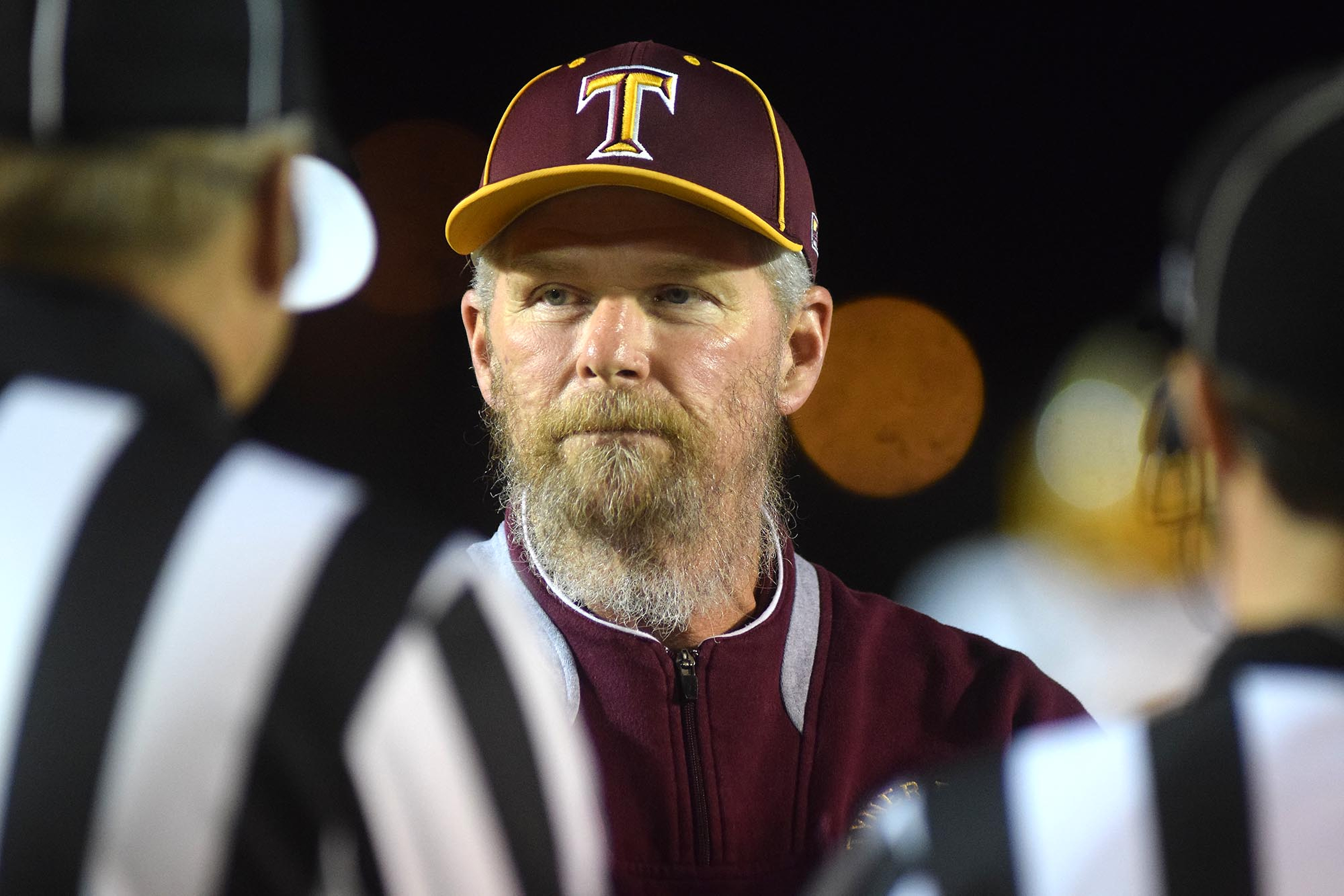 Tyner head coach Wayne Turner talks to the officials before the game. The Tyner Rams visited the Marion County Warriors in a quarterfinal game in the TSSAA State Football Playoffs on Friday November 20, 2015.