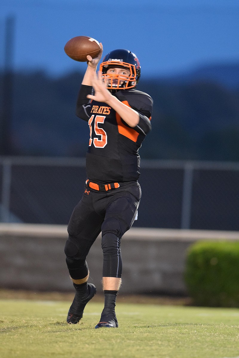 South Pittsburg quarterback Hogan Holland (15) practices before the game.  Grace Baptist Academy visited South Pittsburg in aTSSAA football game on Friday, October 16, 2015.