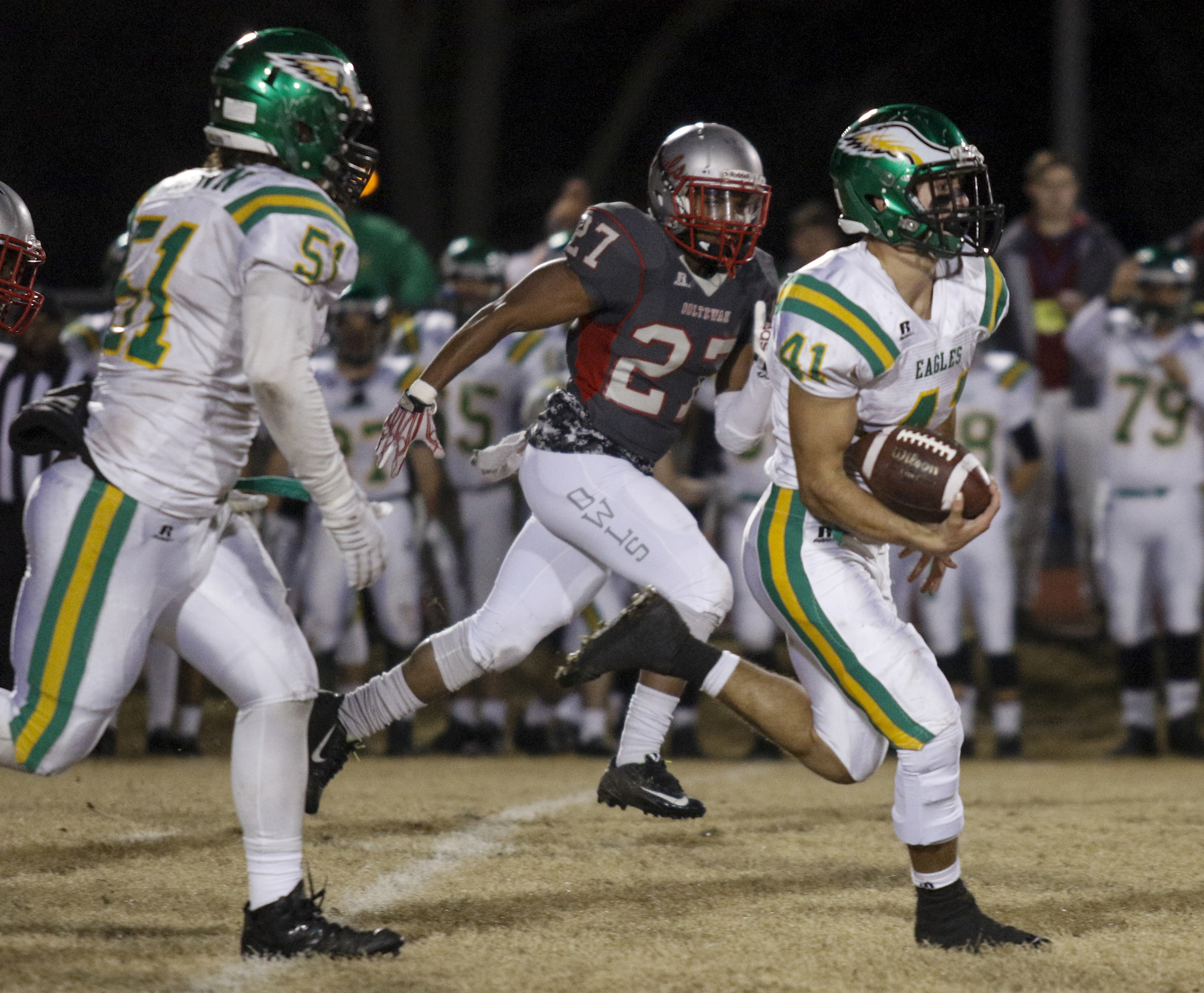 Rhea County's Dylan Smith breaks away from Ooltewah's Jaylin Rogers during their TSSAA prep football playoff football game at Ooltewah High School on Friday, Nov. 20, 2015, in Ooltewah, Tenn.