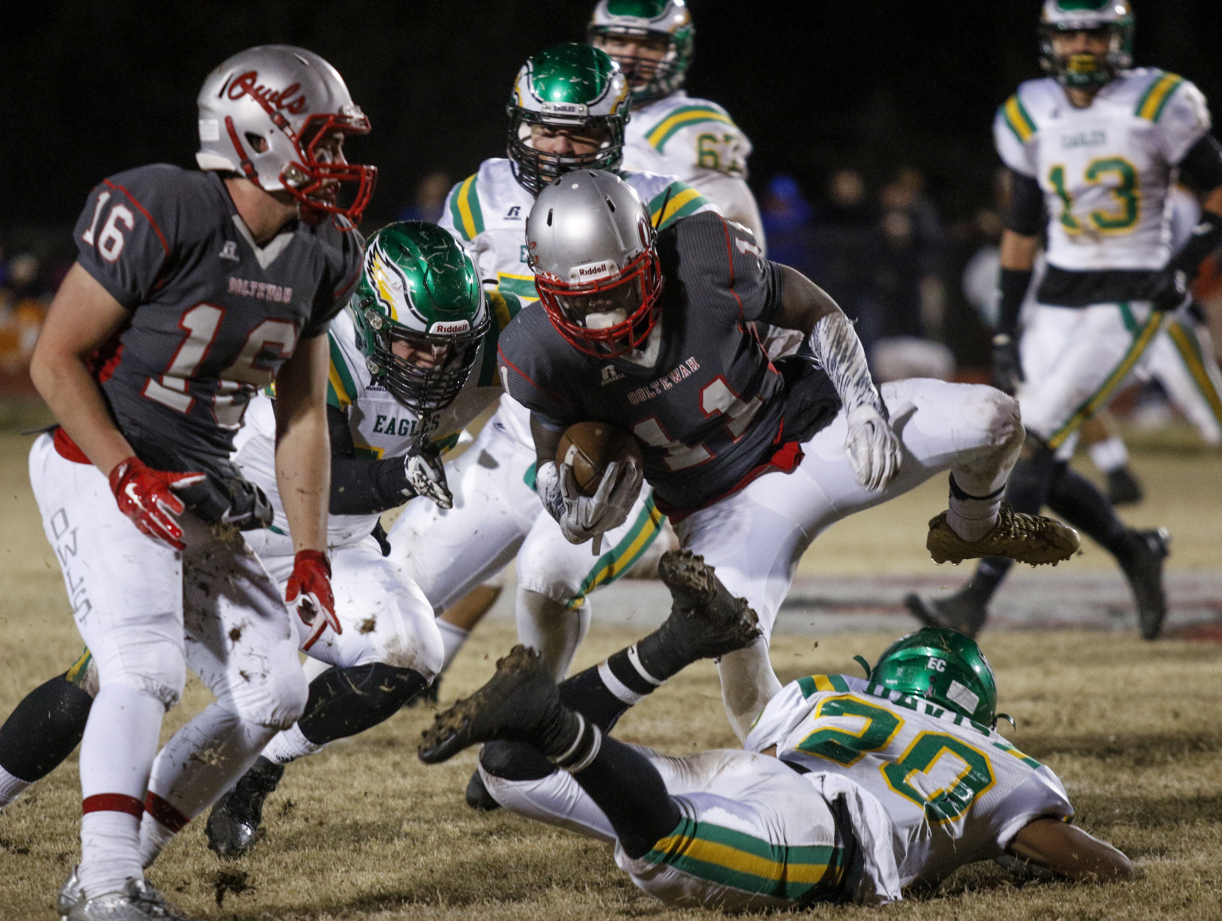 Ooltewah's Rashun Freeman is tackled by Rhea County's Eddie Davis during their TSSAA prep football playoff football game at Ooltewah High School on Friday, Nov. 20, 2015, in Ooltewah, Tenn.