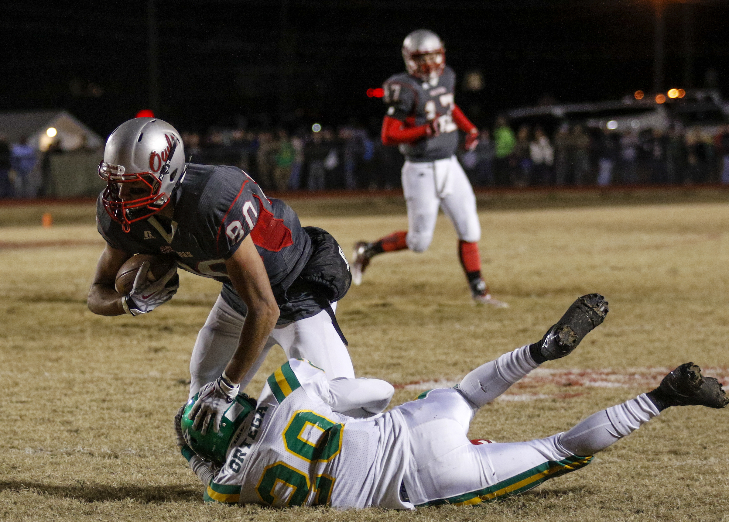 Rhea County's Daniel Ortega tackles Ooltewah's Landon Keown during their TSSAA prep football playoff football game at Ooltewah High School on Friday, Nov. 20, 2015, in Ooltewah, Tenn.