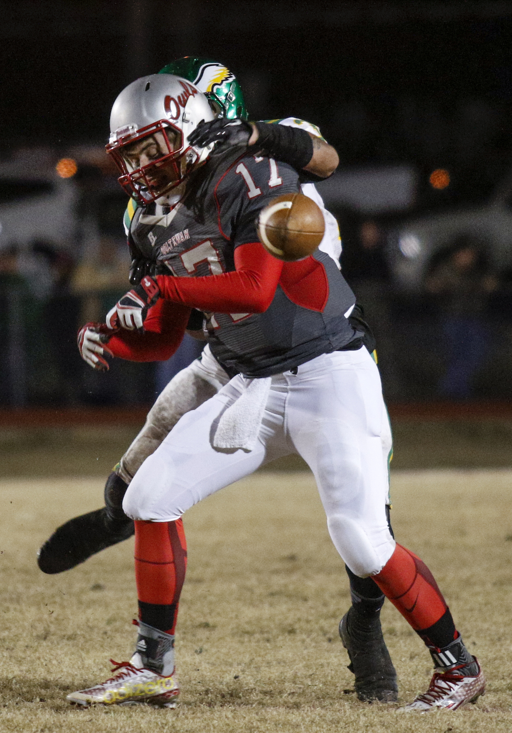 Rhea County's James Sharp sacks Ooltewah quarterback London Elrod during their TSSAA prep football playoff football game at Ooltewah High School on Friday, Nov. 20, 2015, in Ooltewah, Tenn.